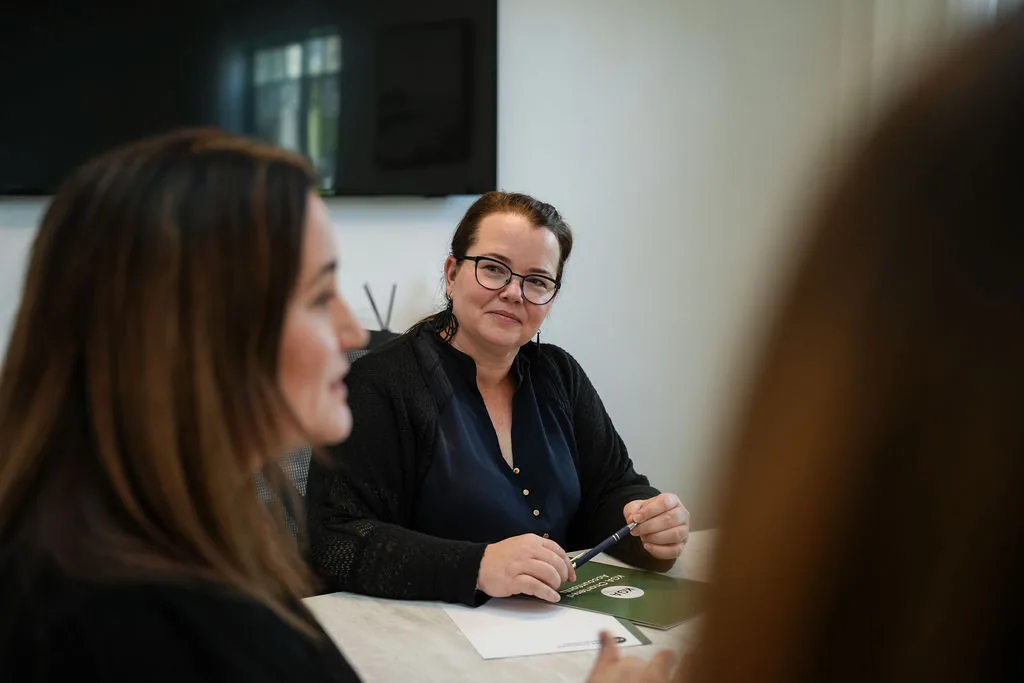A KGA accountant meeting with clients in Warkworth