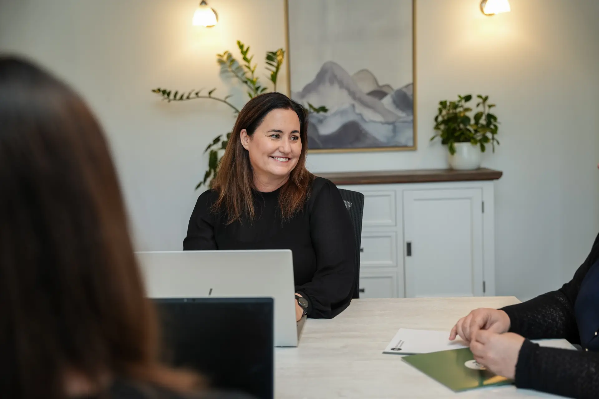 KGA director Jen Smith talking with a business client