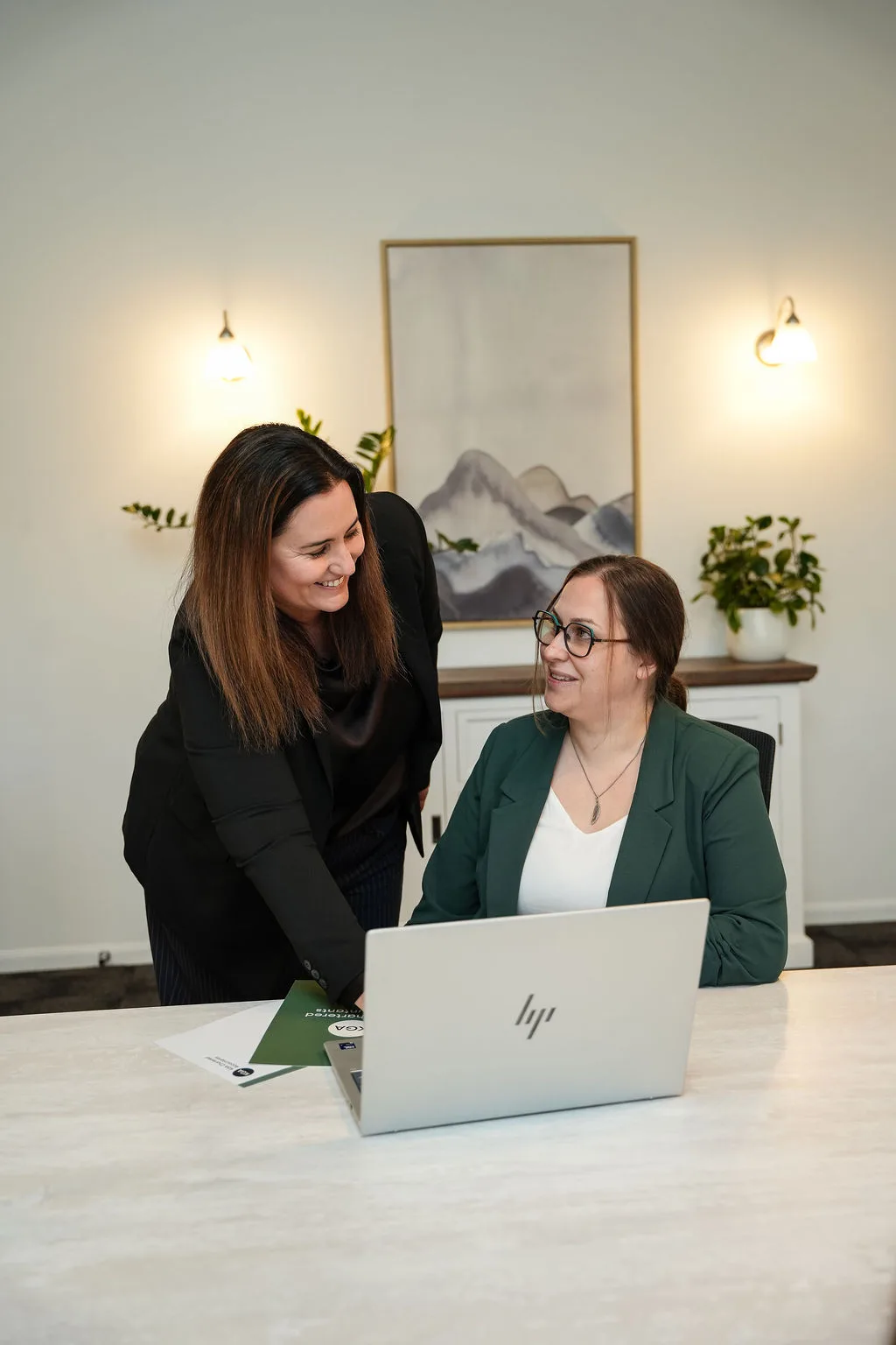 KGA director Jen Smith and a team member reviewing Xero together