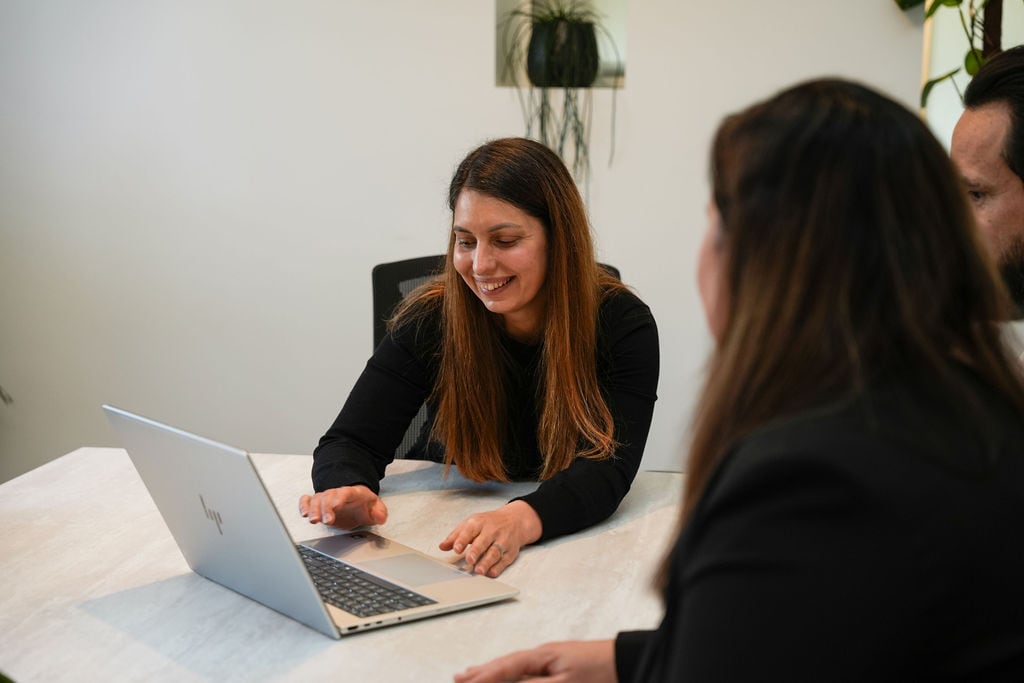 Business owner working at a laptop